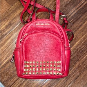 michael kors red mini backpack
